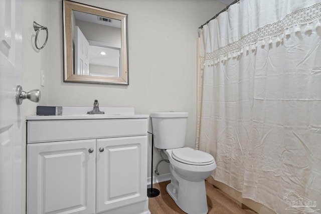 3514 Silvertree Ln, Pensacola, FL 32504 - full bathroom with toilet, wood finished floors, and vanity