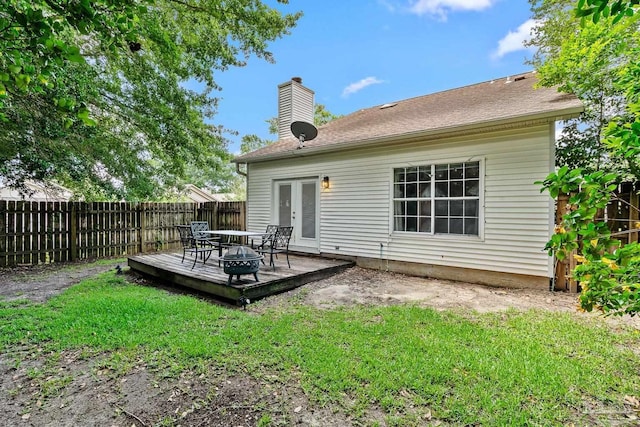 3514 Silvertree Ln, Pensacola, FL 32504 - rear view of house featuring a wooden deck and a chimney