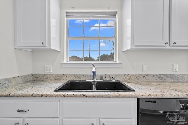 3514 Silvertree Ln, Pensacola, FL 32504 - kitchen featuring a sink, dishwasher, white cabinetry, and light stone counters