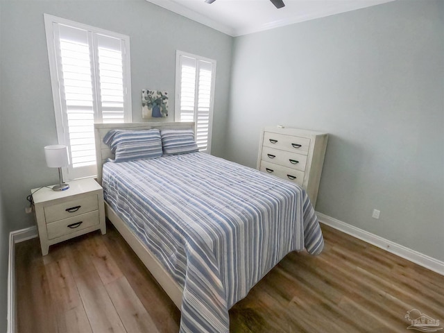 bedroom with ceiling fan, light hardwood / wood-style flooring, and ornamental molding