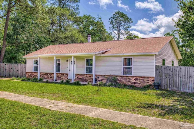 4224 Seaport Rd, Pace, FL 32571 - ranch-style house featuring brick siding, covered porch, and roof with shingles
