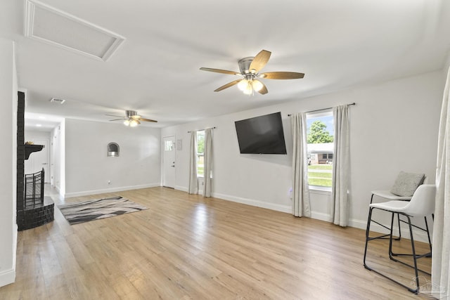 4224 Seaport Rd, Pace, FL 32571 - unfurnished living room with attic access, plenty of natural light, and a ceiling fan