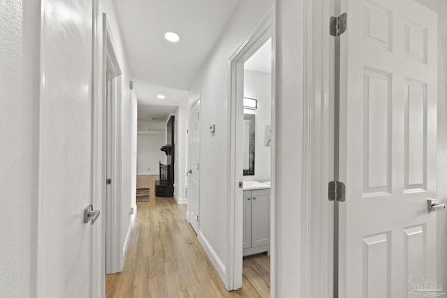 4224 Seaport Rd, Pace, FL 32571 - corridor featuring light wood-style flooring, recessed lighting, and baseboards