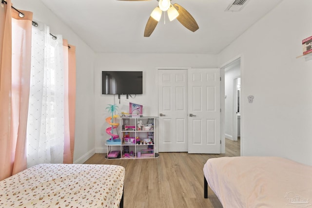 4224 Seaport Rd, Pace, FL 32571 - bedroom featuring wood finished floors, baseboards, and ceiling fan