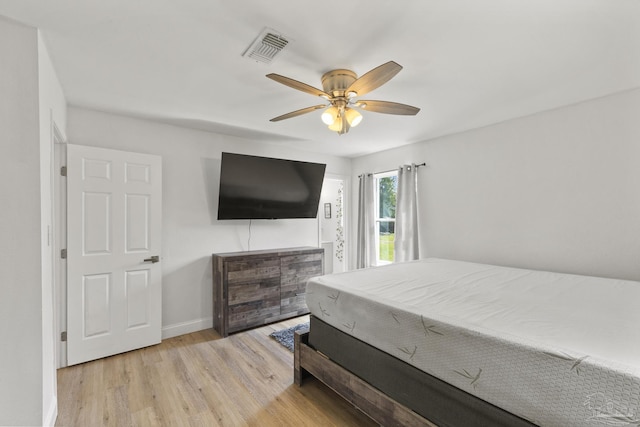 4224 Seaport Rd, Pace, FL 32571 - bedroom featuring light wood-type flooring, baseboards, and ceiling fan