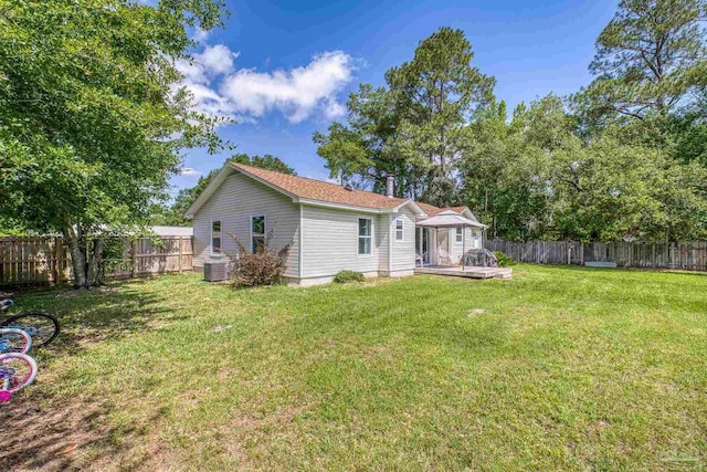 4224 Seaport Rd, Pace, FL 32571 - back of house with a deck and central AC unit