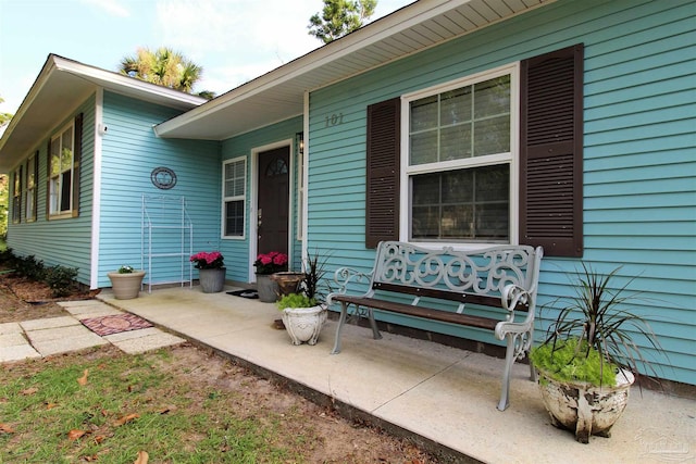 entrance to property featuring a patio area