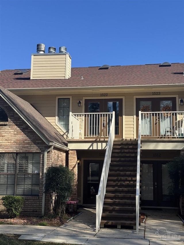 view of building exterior with stairway