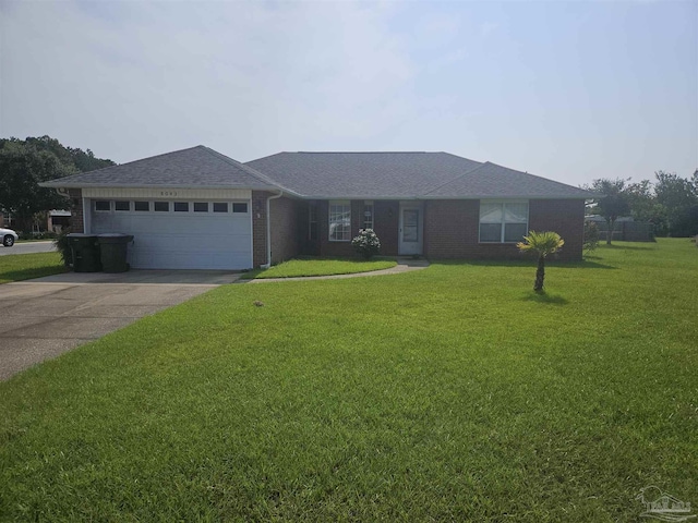 ranch-style house featuring concrete driveway, roof with shingles, an attached garage, a front lawn, and brick siding