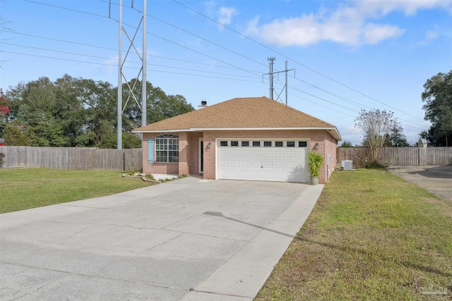 single story home featuring a garage and a front lawn