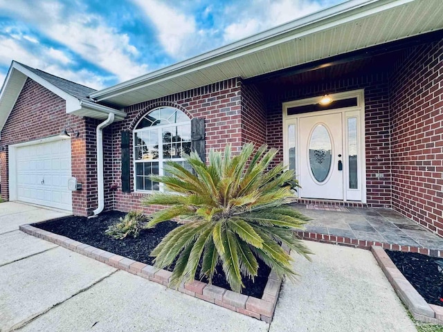 entrance to property with a garage