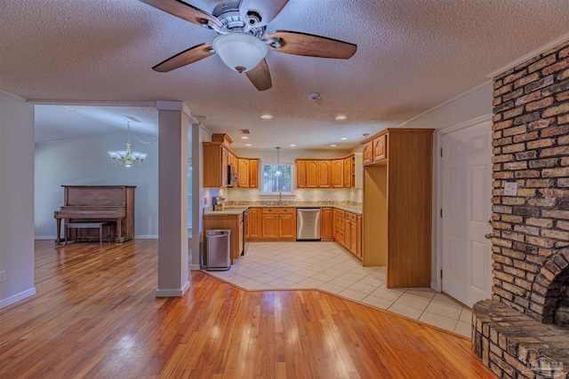 4679 E Spencer Field Rd, Pace, FL 32571 - kitchen with a textured ceiling, dishwasher, light wood-style flooring, and ceiling fan with notable chandelier
