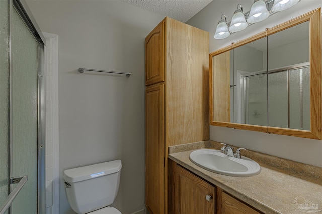 4679 E Spencer Field Rd, Pace, FL 32571 - bathroom with a shower with shower door, toilet, and vanity