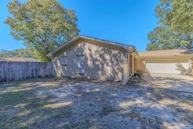 view of home's exterior with a garage