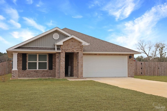 ranch-style home with a garage and a front yard