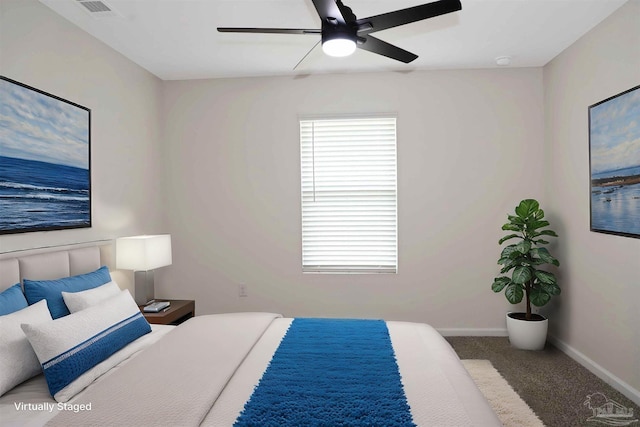 carpeted bedroom featuring ceiling fan