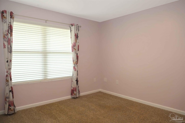 view of carpeted spare room