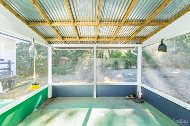 unfurnished sunroom with plenty of natural light