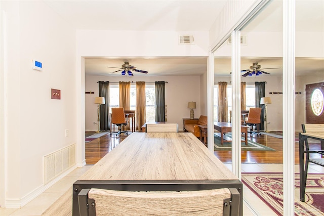 kitchen with hardwood / wood-style floors and ceiling fan