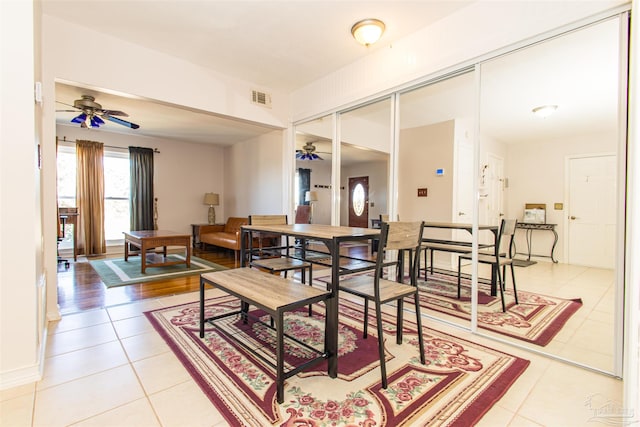 dining room featuring light wood-type flooring and ceiling fan