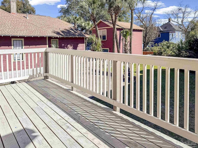 wooden deck featuring a residential view