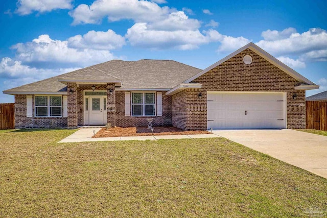 ranch-style house with concrete driveway, brick siding, an attached garage, and a front yard