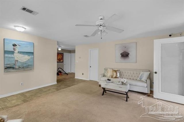 living room featuring light carpet