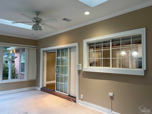 property entrance with visible vents and ceiling fan