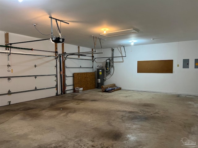 garage featuring water heater, a garage door opener, and electric panel