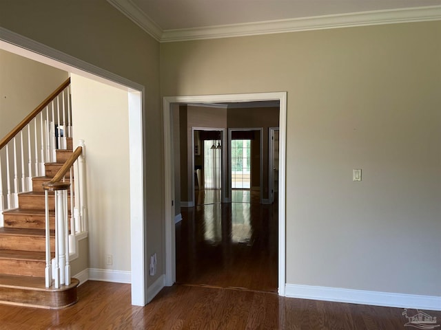 interior space featuring crown molding, stairs, dark wood-type flooring, and baseboards