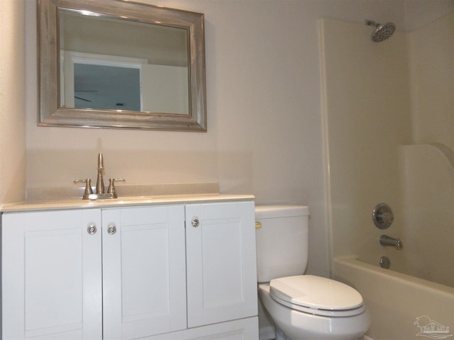 full bath with toilet, shower / bathtub combination, and vanity