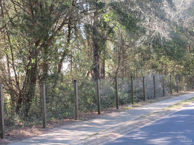 view of street featuring a view of trees