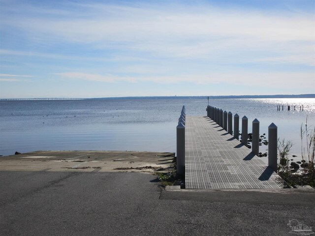 view of dock with a water view