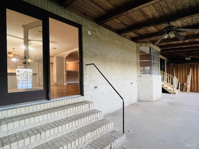 interior space featuring ceiling fan and a patio