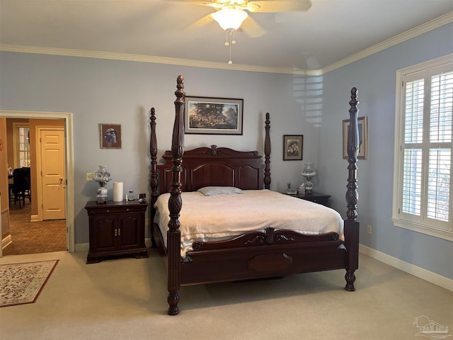 bedroom featuring ornamental molding, light carpet, and ceiling fan