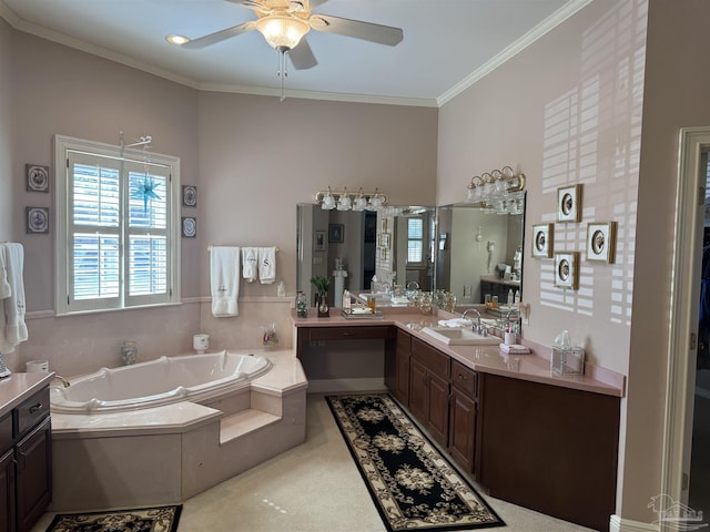 bathroom featuring vanity, tiled tub, ornamental molding, and ceiling fan