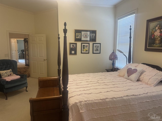 bedroom featuring crown molding and carpet floors