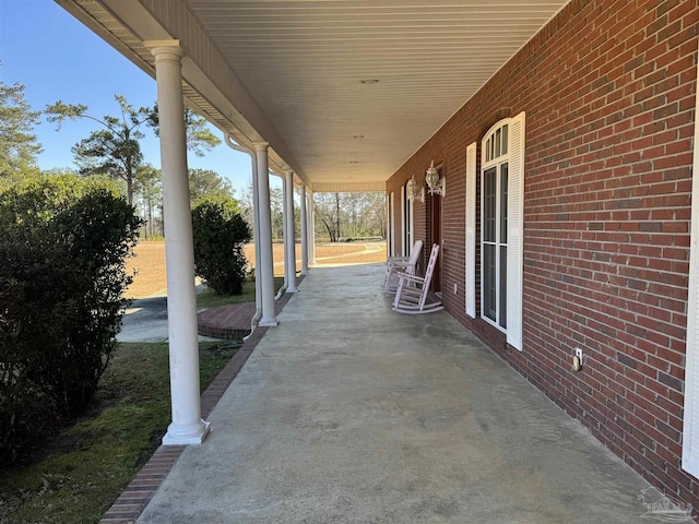 view of patio featuring a porch