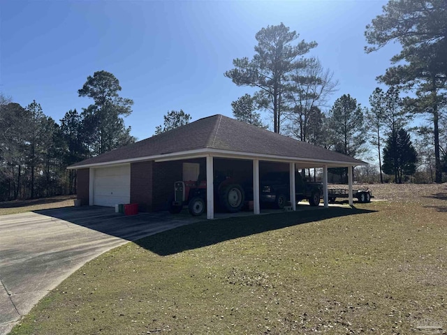 garage featuring a yard