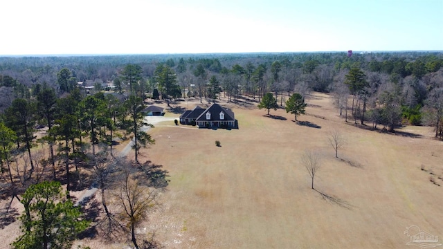 birds eye view of property with a rural view