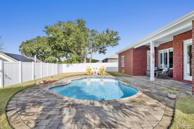 view of pool with a patio