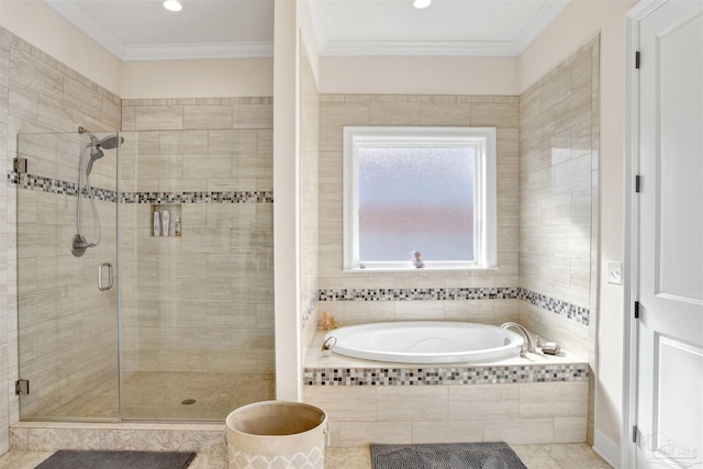 bathroom with tile patterned flooring, independent shower and bath, and ornamental molding