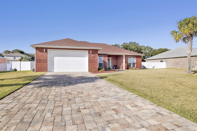 view of front facade featuring a front yard and a garage