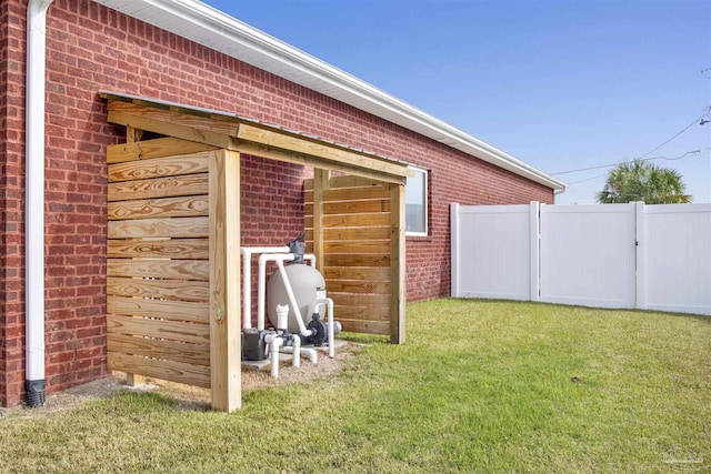 view of property exterior featuring a lawn