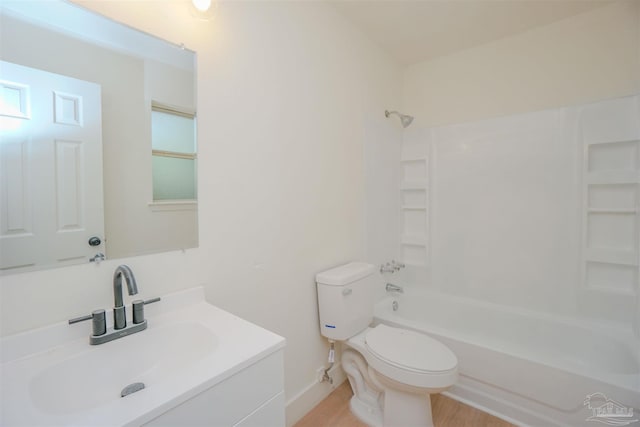 full bathroom featuring shower / tub combination, toilet, and vanity