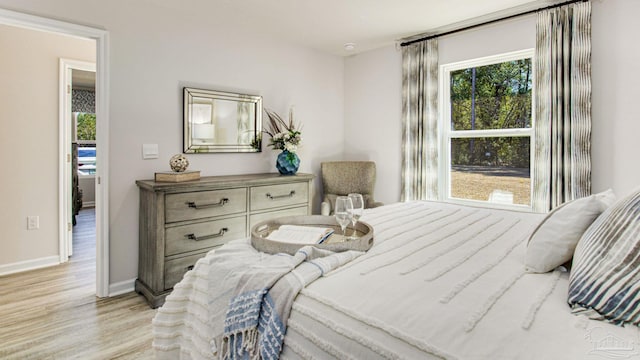 bedroom featuring light hardwood / wood-style flooring