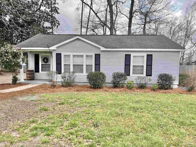 704 E Horner St, Atmore, AL 36502 - view of front of house with a shingled roof