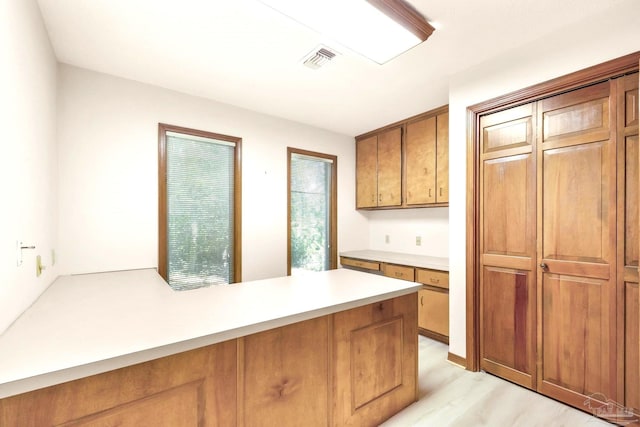 kitchen with light hardwood / wood-style flooring