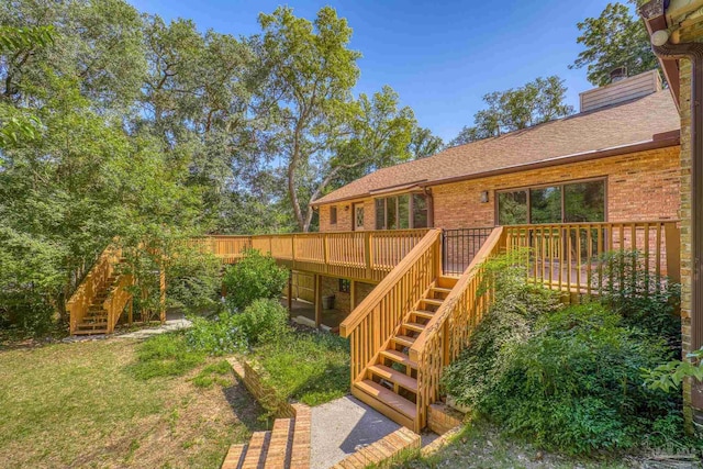 view of yard featuring a wooden deck