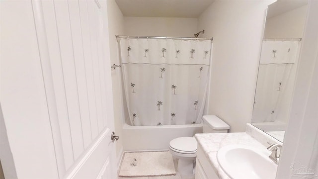 bathroom featuring shower / tub combo, vanity, and toilet